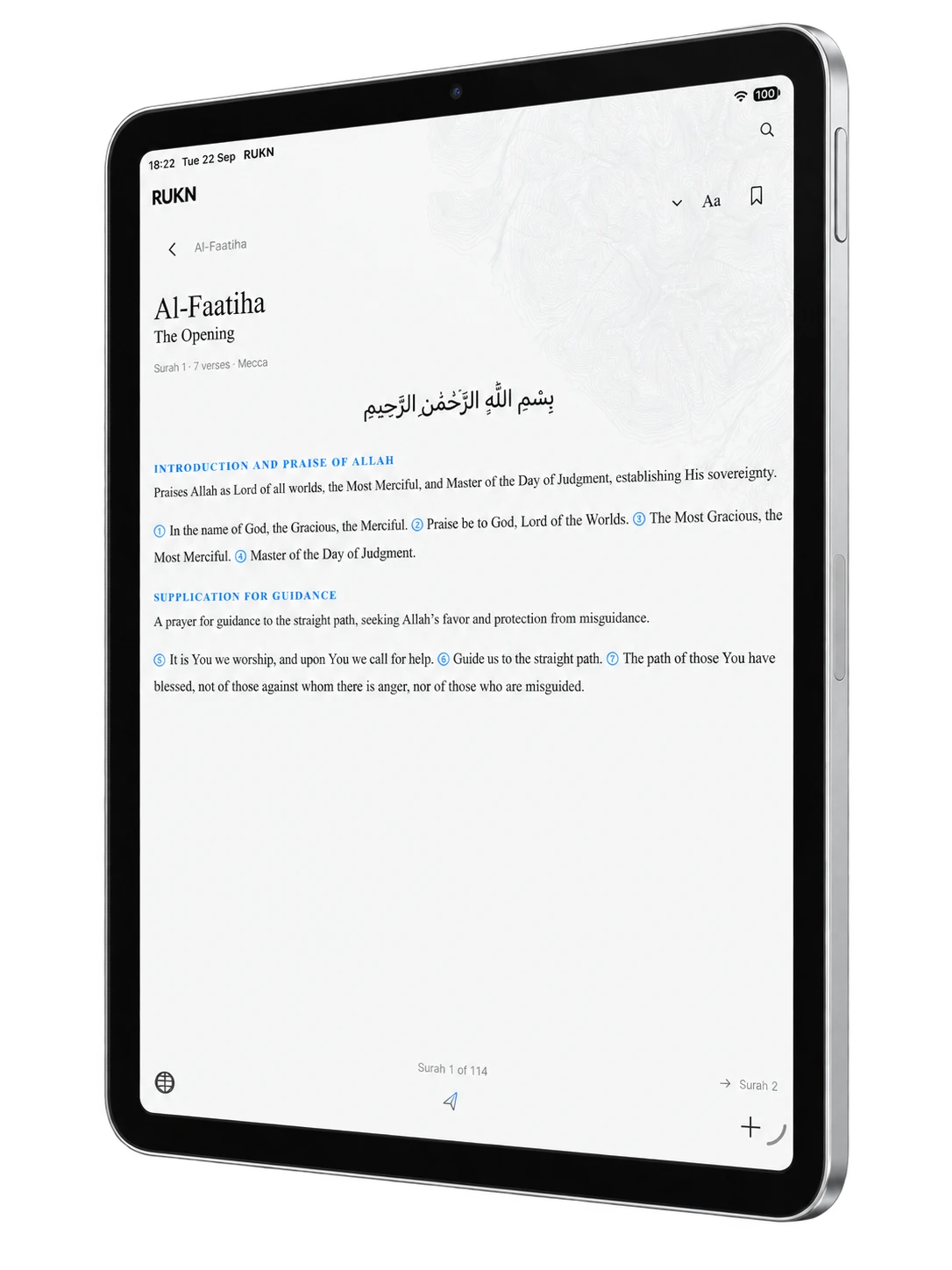 RUKN Quran Book view on a silver iPad, showing Arabic and translation